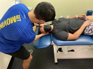Physical therapist treating person with BPPV