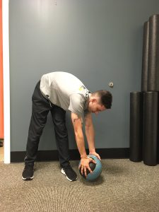 Man demonstrating poor bending mechanics